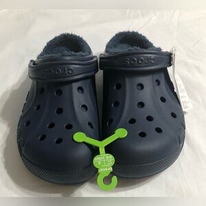 Men’s Crocs Baya lined Sherpa slide on back strap flips up blue.11